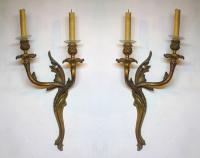 A Pair of French Louis XV style two-light wall appliques. Ca 1900